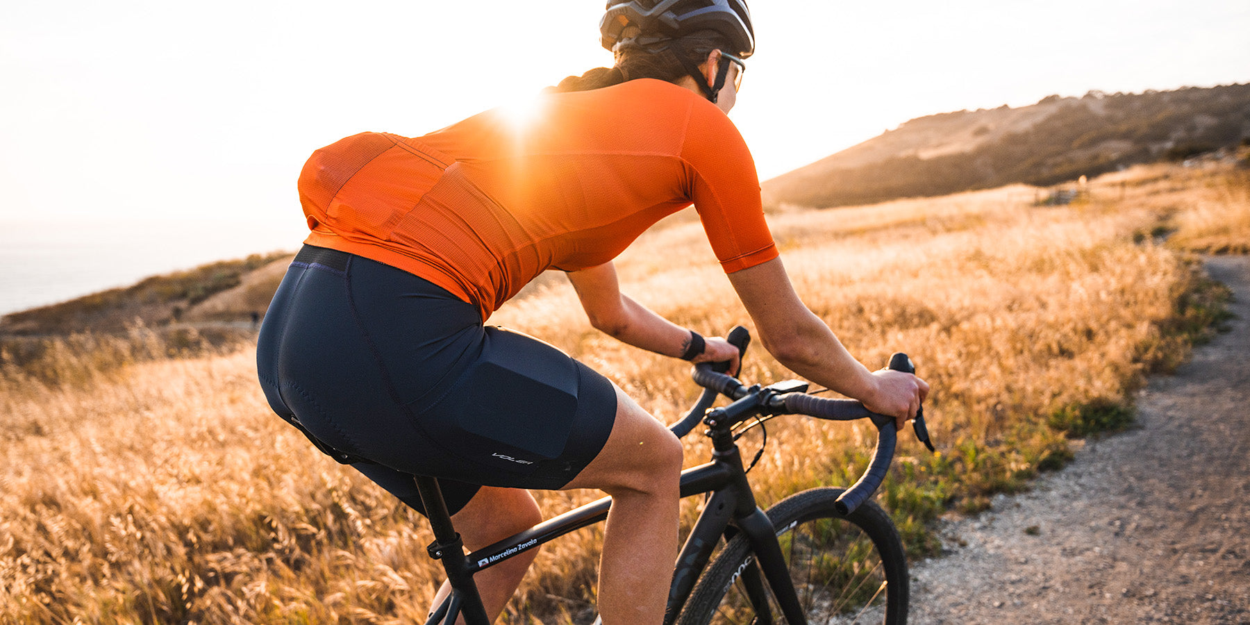 cyclist on dirt road