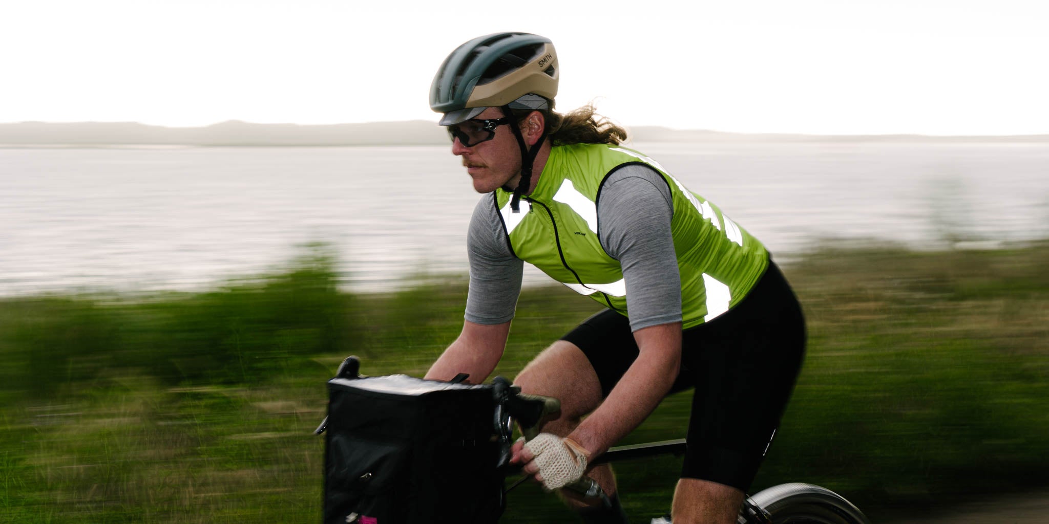 reflective wind vest with bay in background