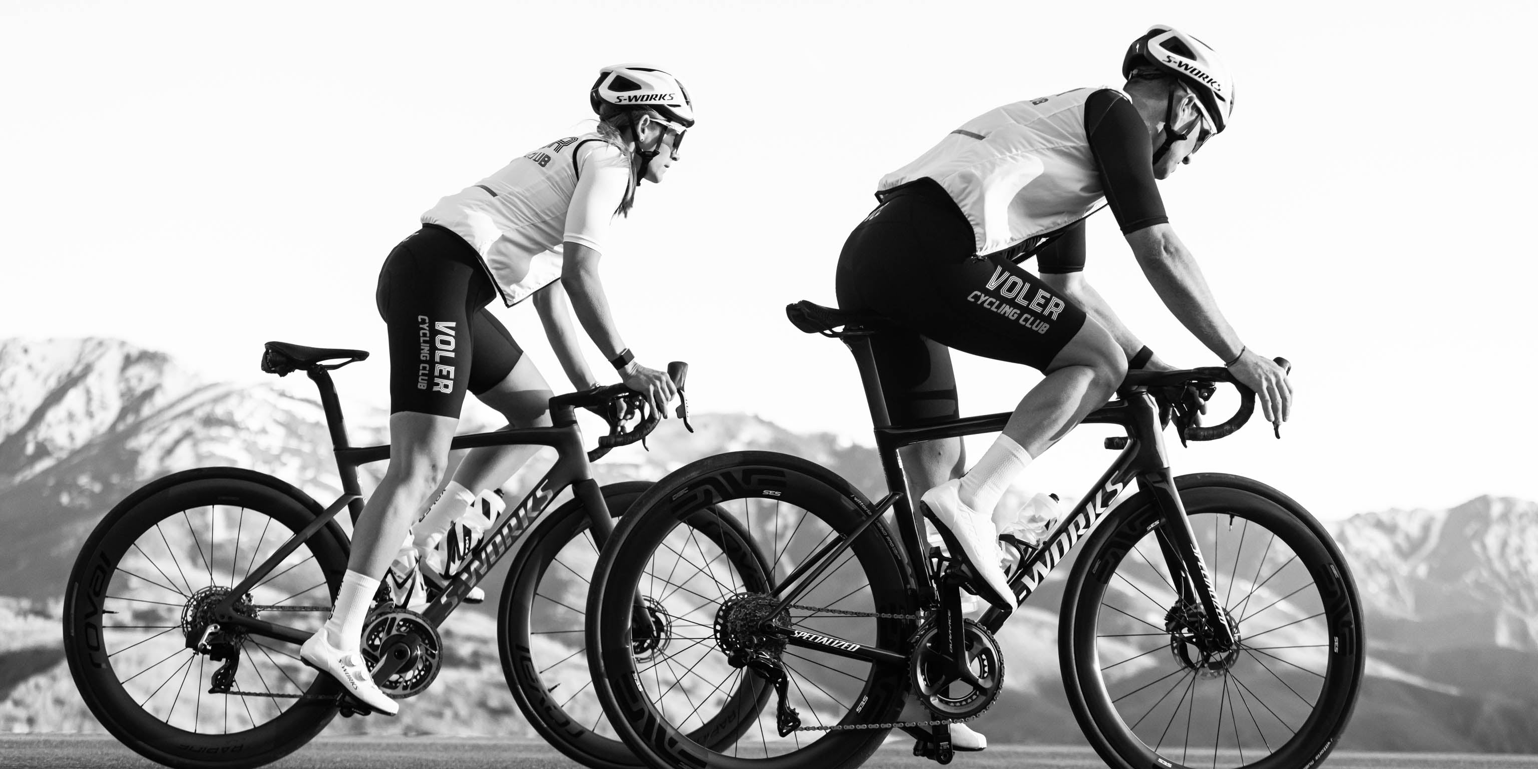 Voler Cycling Club kits black and white mountains in background