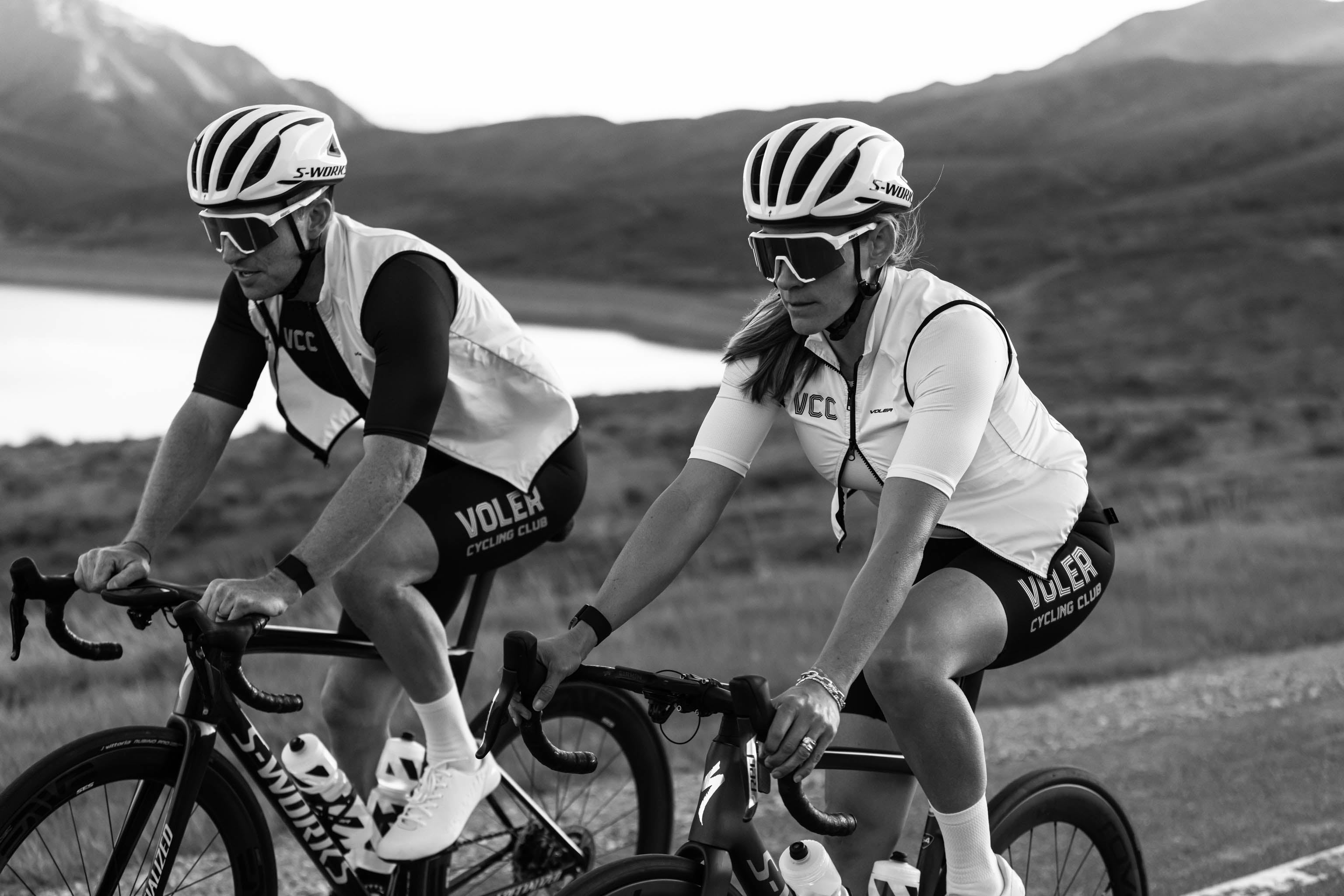 male and female cyclists in VCC kits riding